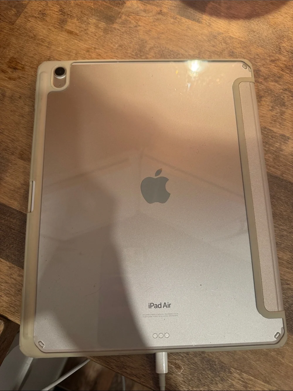 iPad Air with White Smart Cover and Stylus.